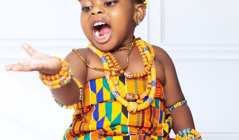 Child wearing jewellery from a kids jewellery box