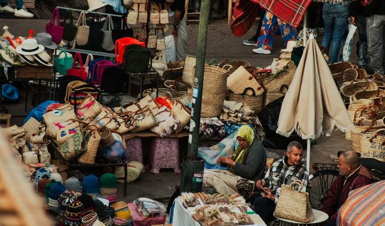 Bustling traditional souk market in Marrakech medina